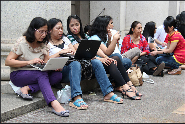 A luxury too far? Migrant workers in Hong Kong rely on laptops to contact their families - KC Wong A luxury too far? Migrant workers in Hong Kong rely on laptops to contact their families - KC Wong (https://www.flickr.com/photos/77290926@N07/7128911245)